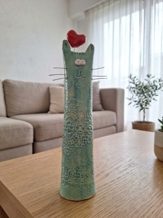 Gatito verde agua con corazón